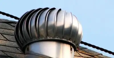 attic fan installation services with professionally installed roof ventilation unit in Des Moines, IA