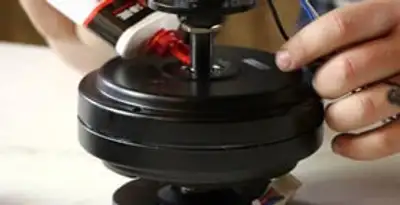 Ceiling fan motor repair and internal component adjustment in Des Moines, IA