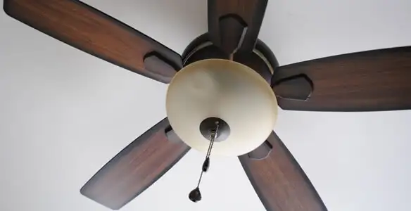 Fully installed ceiling fan with balanced blades and light fixture in Des Moines, IA