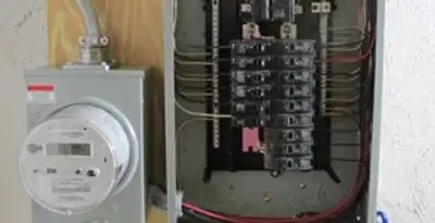electrical panel upgrade service showing outdated electrical panel prepared for professional replacement in Des Moines, IA