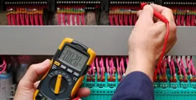 electrical service showing professional testing and troubleshooting of electrical panel by licensed electricians in Des Moines, IA