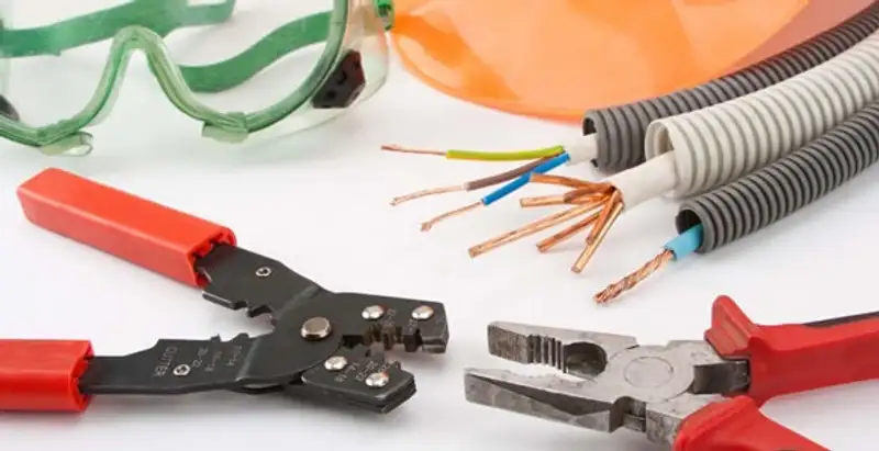 Electrical wiring repair with professional tools and safety equipment in Norwalk, IA