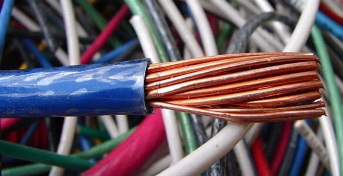 electrical wiring services showing exposed copper conductors and cable preparation in Des Moines, IA
