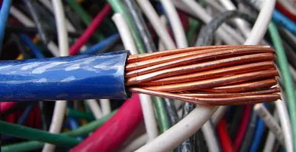 electrical wiring services showing exposed copper conductors and cable preparation in Des Moines, IA