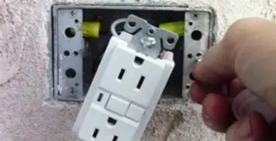 gfci circuits service showing installation of a ground fault circuit interrupter outlet by licensed electricians in Des Moines, IA