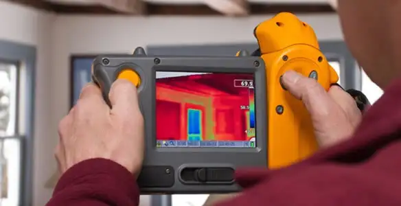 home energy audit service capturing thermal readings to analyze insulation and electrical efficiency in Des Moines, IA