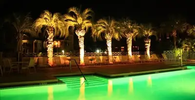 landscape lighting installation services illuminating outdoor recreational areas in Des Moines, IA