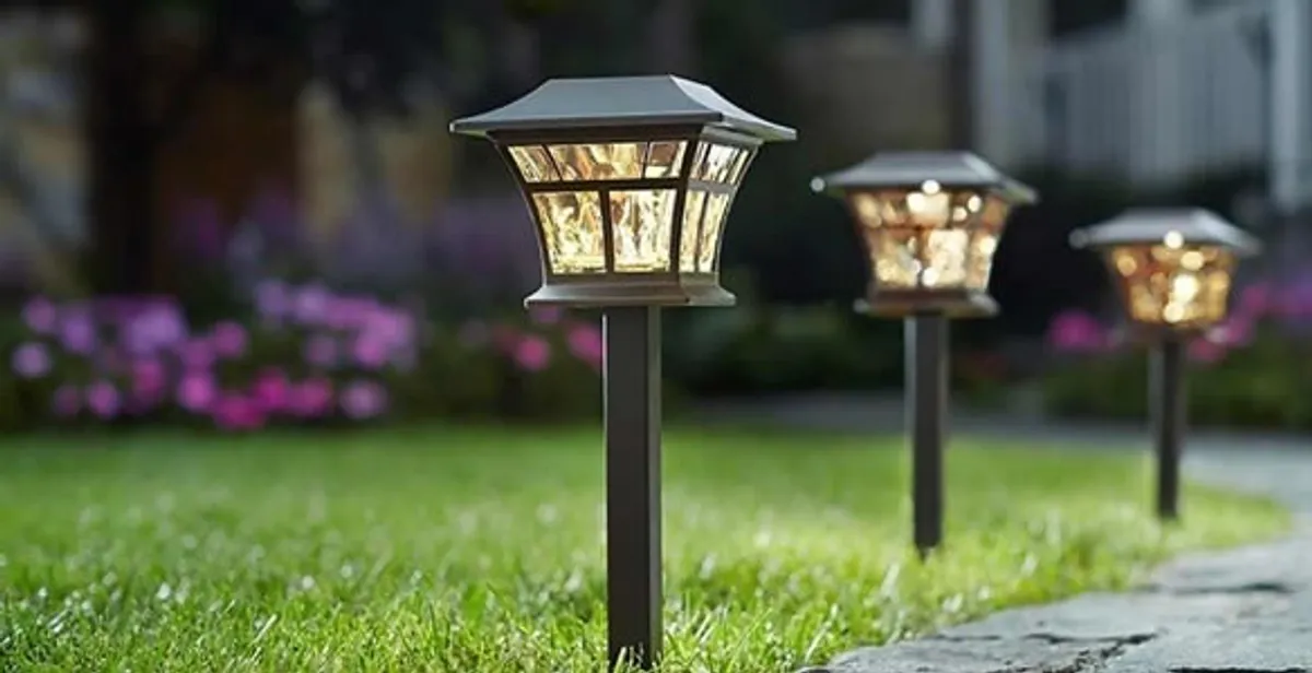 landscape lighting installation services with professionally installed pathway lights in Des Moines, IA