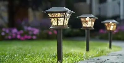 landscape lighting installation services with professionally installed pathway lights in Des Moines, IA