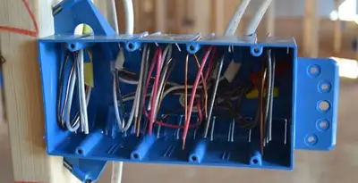 new construction wiring installation featuring electrical boxes and cable routing by expert electricians in Des Moines, IA
