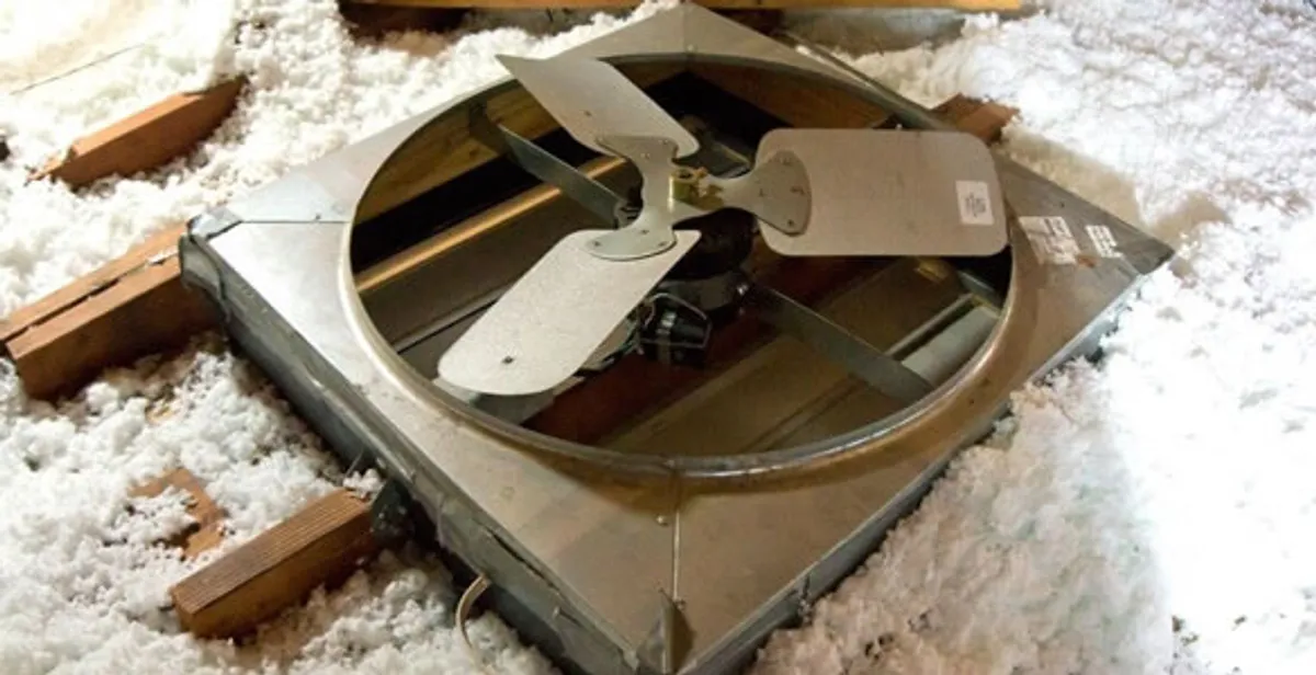 whole house fan installation services with attic-mounted ventilation unit in Des Moines, IA